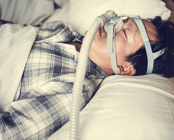 man with CPAP mask on