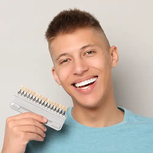 Young man with porcelain veneers