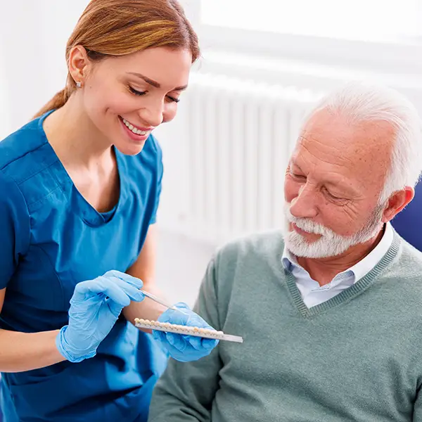 Dentist showing veneer options