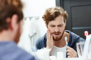 Tooth pain while brushing teeth
