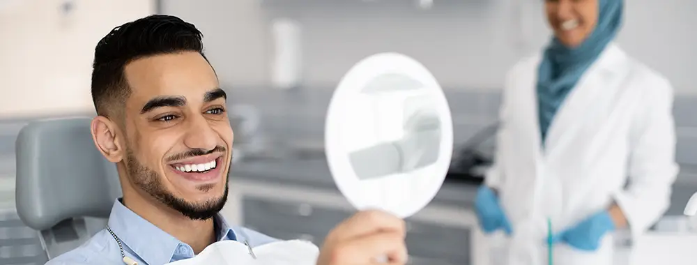 Man with new veneers