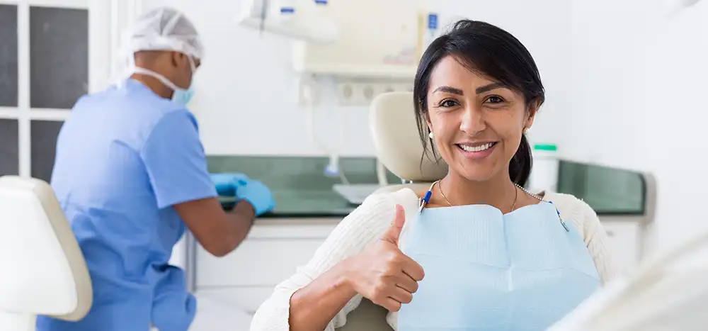 Woman getting professional fluoride treatment