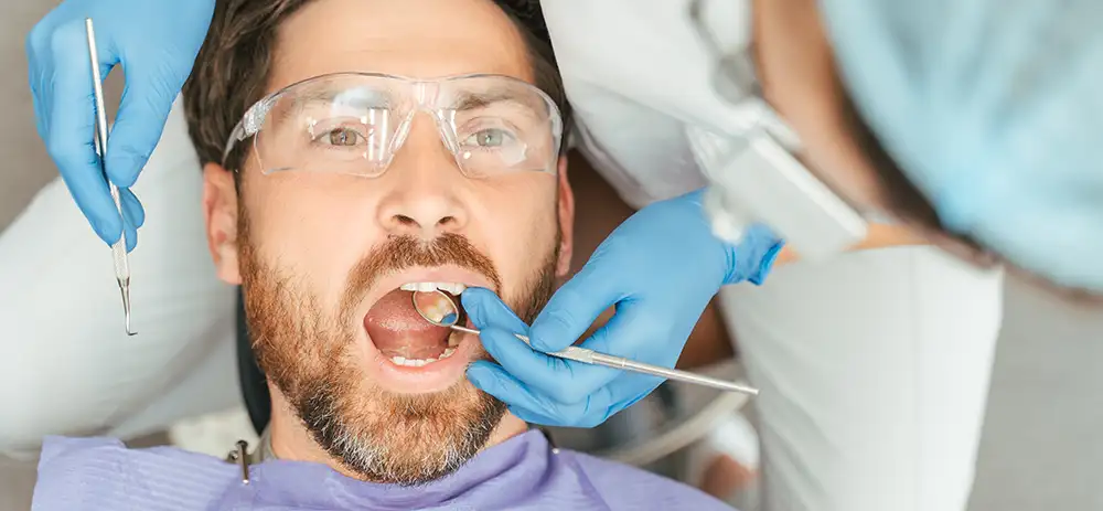 Man getting dental cleaning