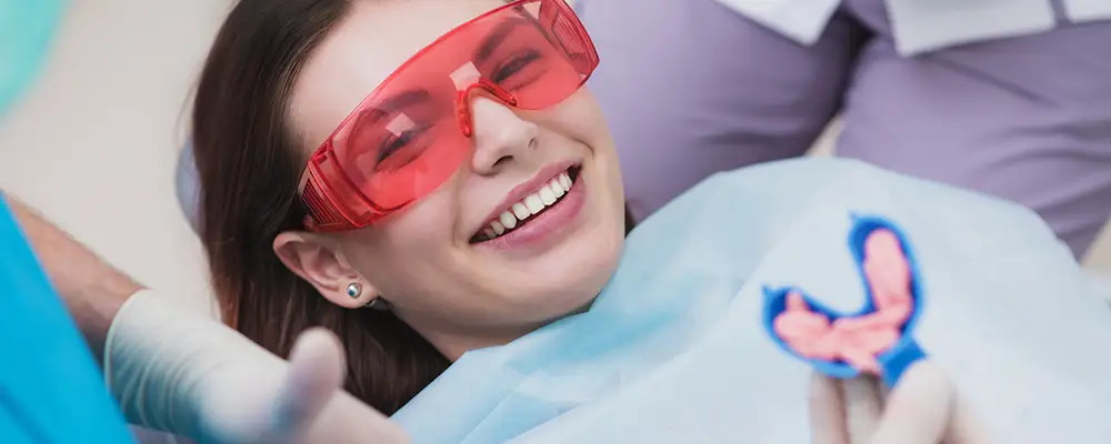 woman receiving professional fluoride treatment
