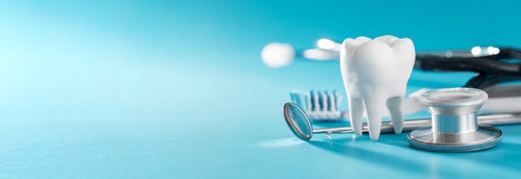 White healthy tooth, different tools for dental care. Dental background.