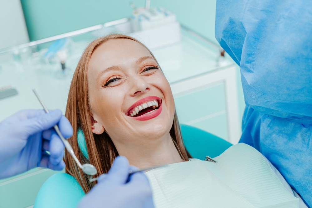 Patient smiling during a dental exam at our Hampton, VA office 