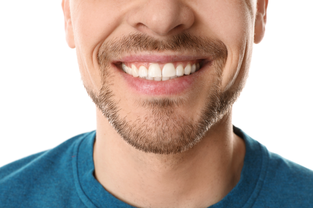 Close up of a man's healthy, white smile in the Virginia Beach community 