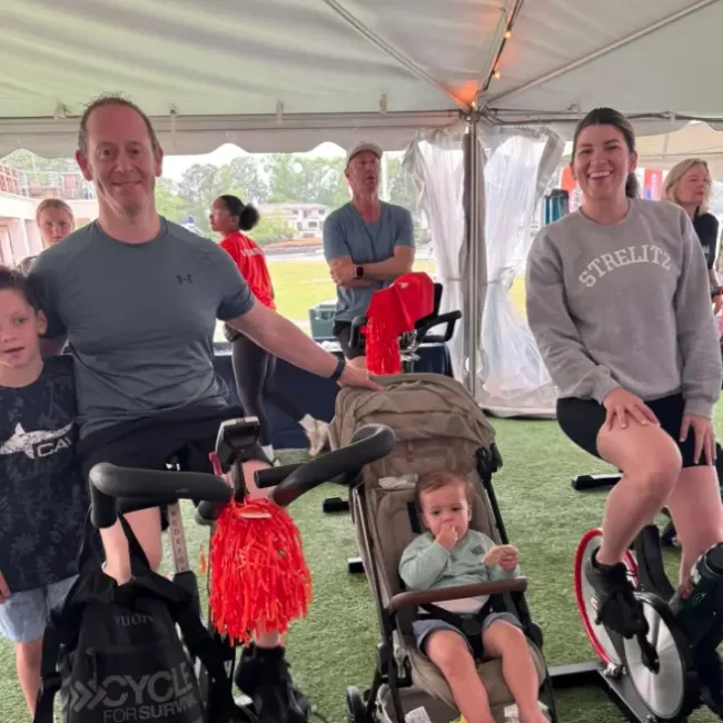 Adam Foleck at a cycling fundraiser with family and friends