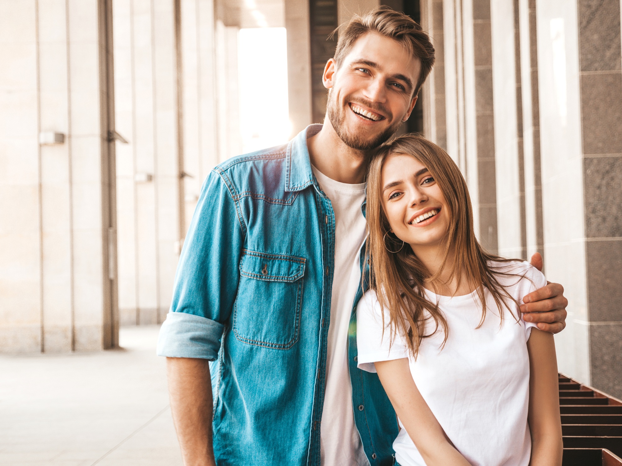 Couple smiling together outdoors in the Virginia Beach community 