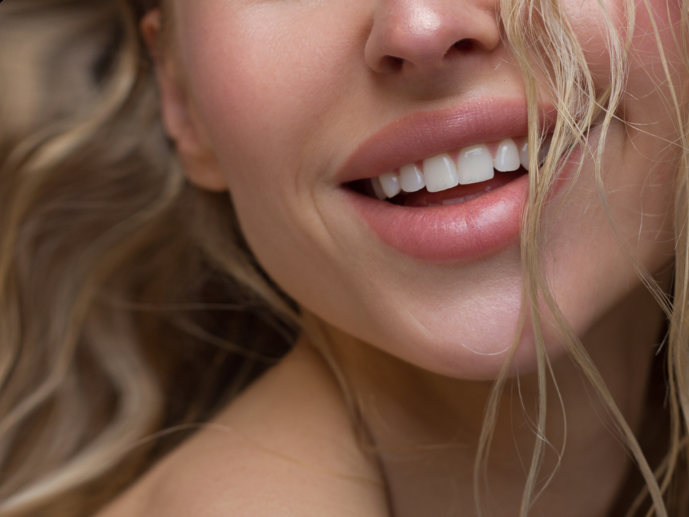 Bright, healthy smile: dental care in the Norfolk community Close-up of a bright, healthy smile reflecting the results patients enjoy in the Norfolk community
