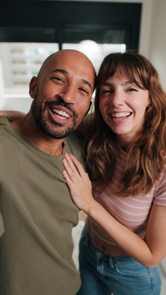 Happy Hampton residents: local life near Kecoughtan Road Couple laughing together indoors